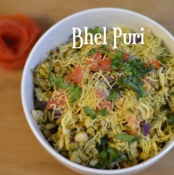 bhel puri served in a bowl garnished with cilantro