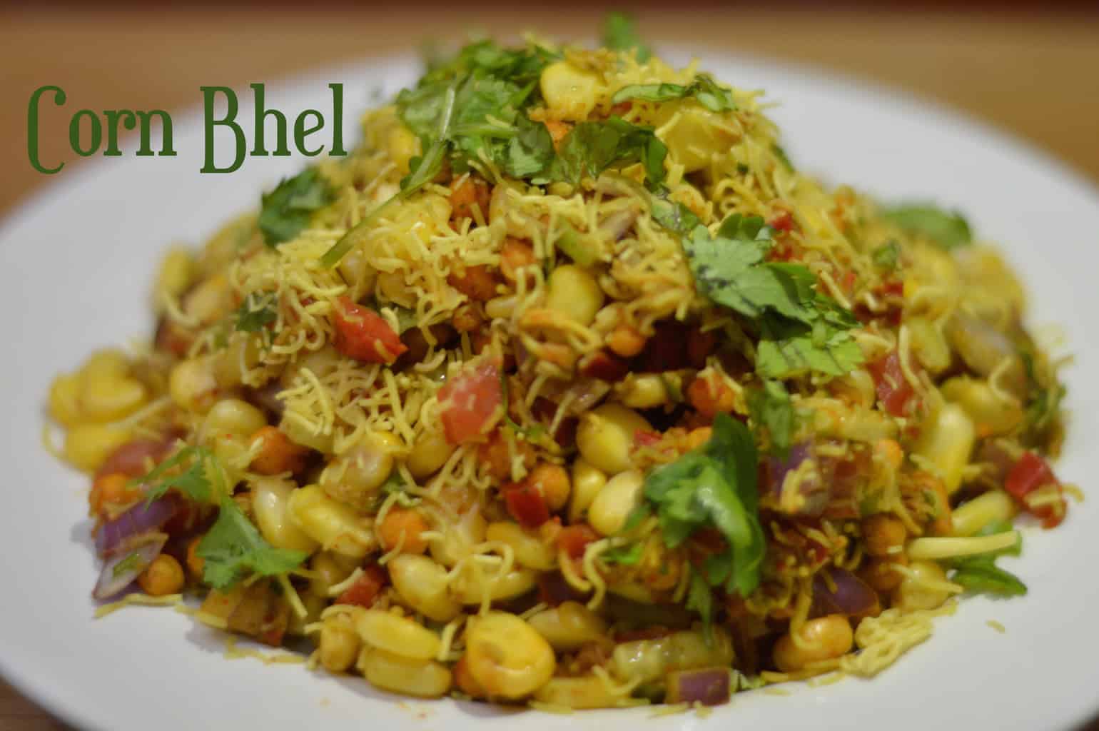 corn bhel chaat served on a plate garnished with cilantro