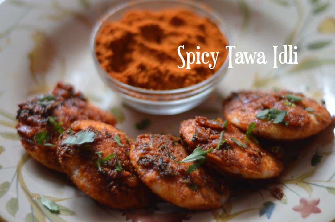 Spicy Tawa Idli served on a plate with idli podi on the side