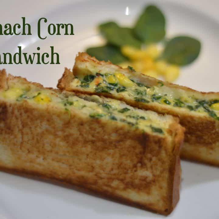 spinach corn sandwich cut into rectangle shape served in a plate