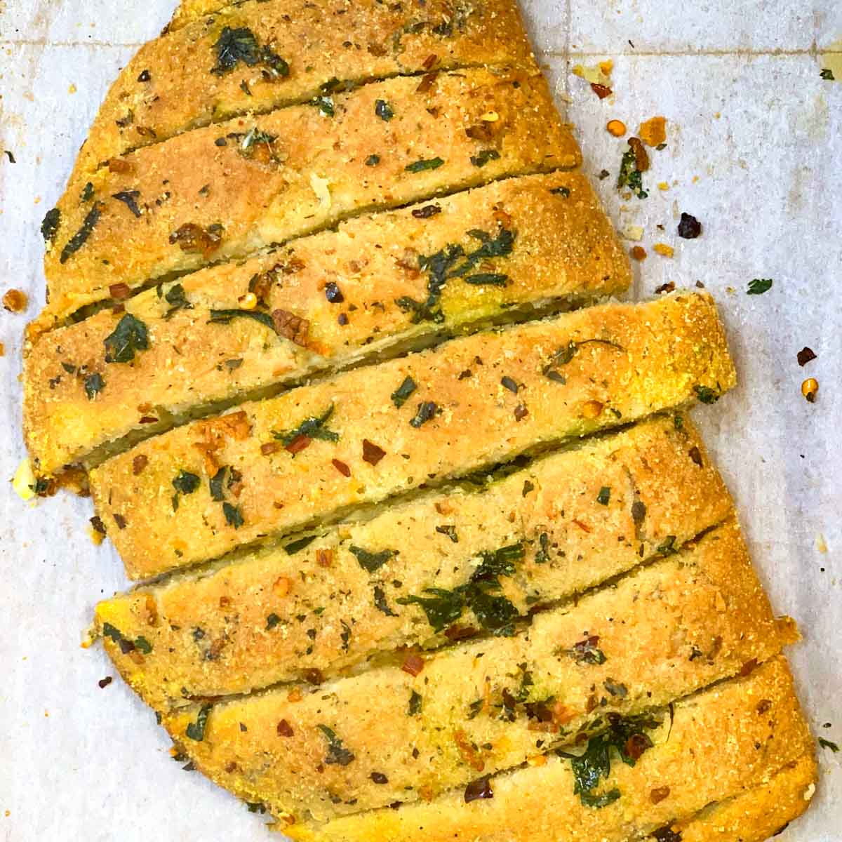 Stuffed Cheesy Garlic Bread sliced into sticks