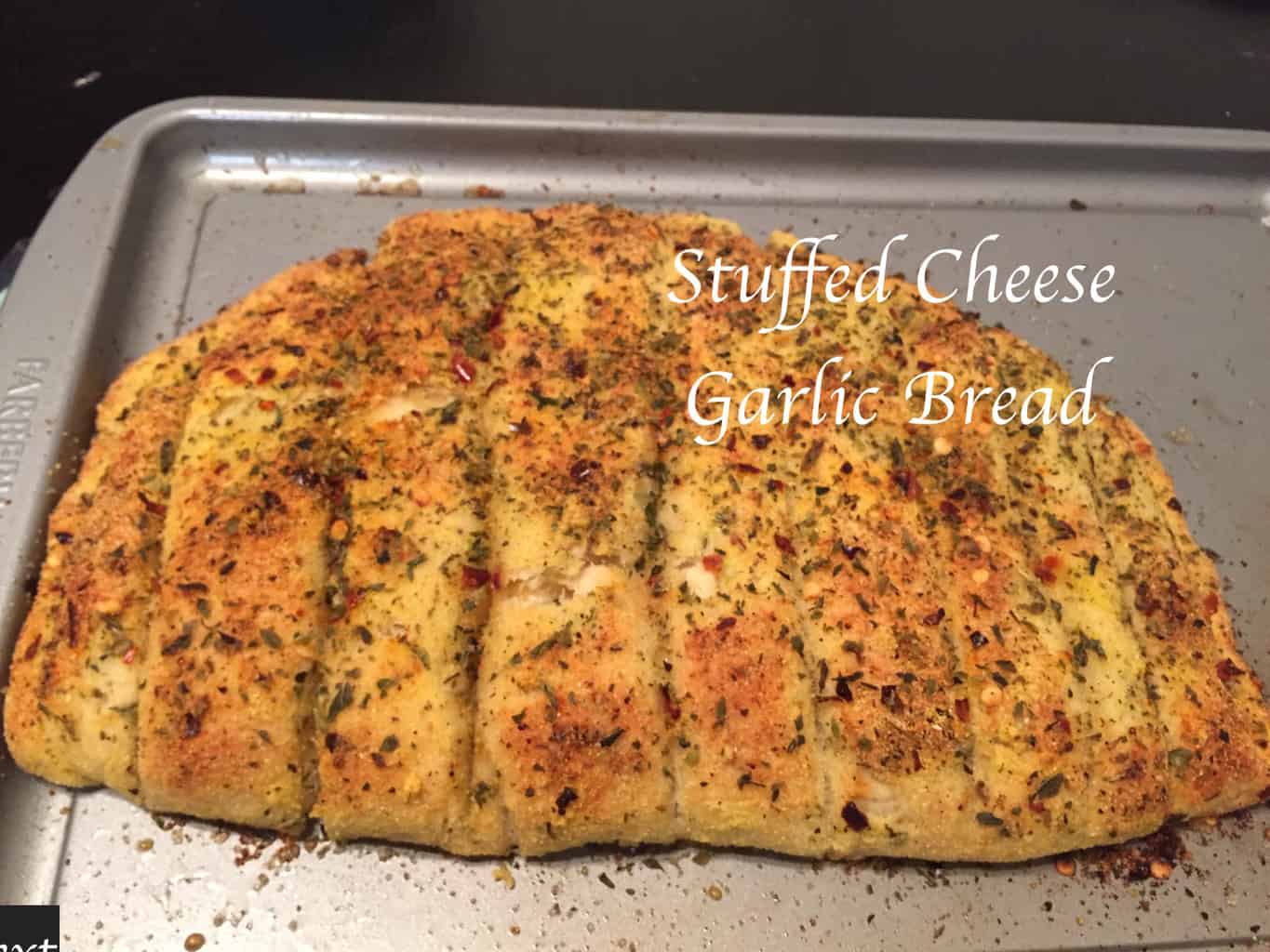 This Stuffed Cheezy Garlic Bread is a copycat version of Dominos Stuffed Garlic bread which is homemade, creamy, cheesy garlic flavored bread recipe
