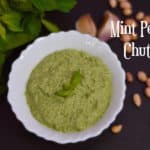 Mint Peanut Chutney served in a bowl garnished with mint leaves