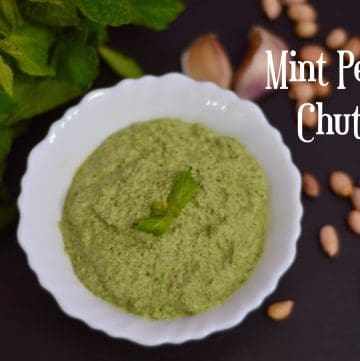 Mint Peanut Chutney served in a bowl garnished with mint leaves