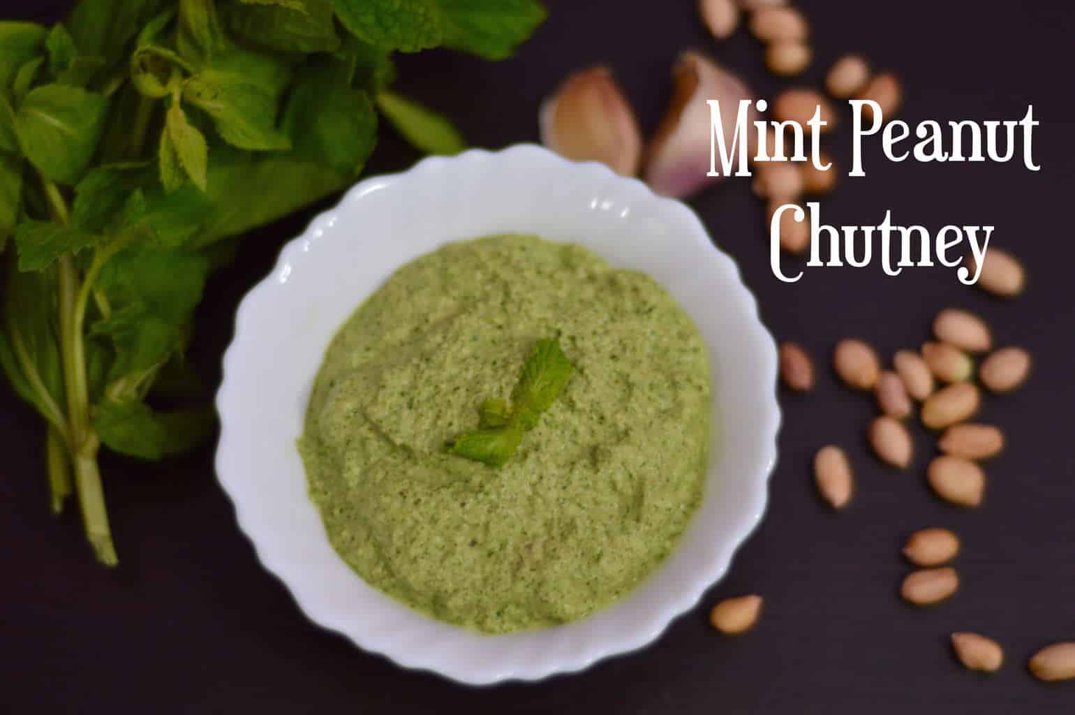 Mint Peanut Chutney served in a bowl garnished with mint leaves