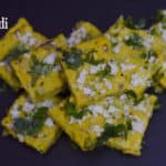 north karnataka jhunka vadi served on a plate garnished with cilantro and coconut