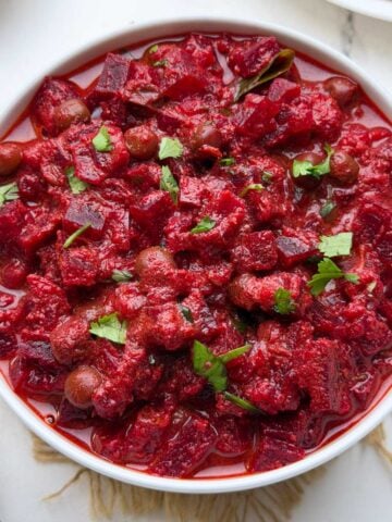 pressure cooker Beetroot kurma served in a white bowl.