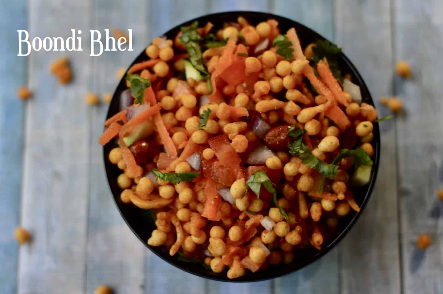 Boondi Bhel served in a bowl garnished with cilantro