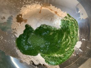 step to add spinach puree to wheat flour