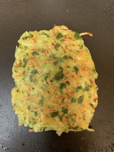 cooked potato pancakes on tawa