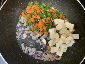 step to saute vegetables and paneer