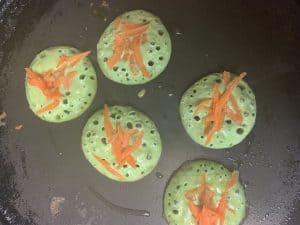 step to cook spinach coin dosa with carrot on top