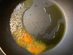 step to prepare tempering and add turmeric