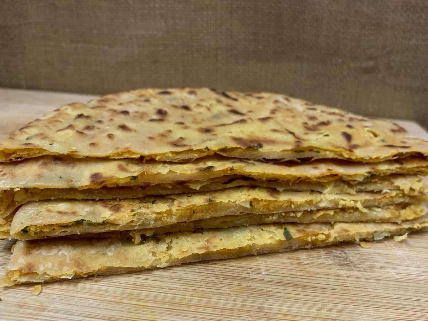 chickpea parathas stacked on one another