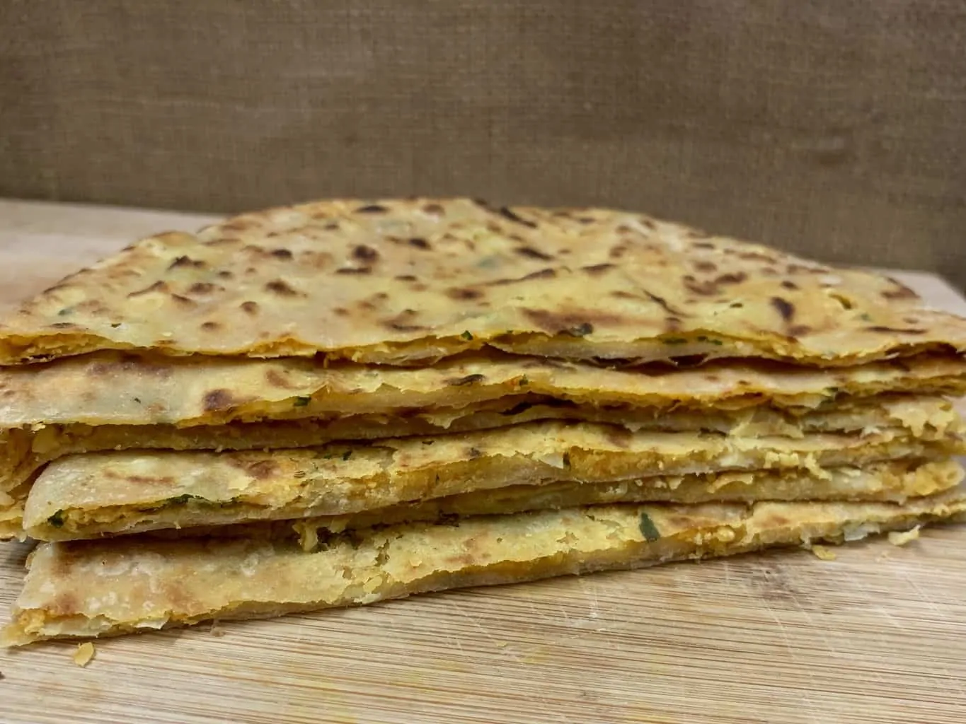 chickpea parathas stacked on one another