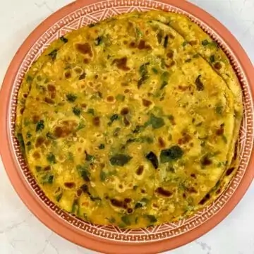 drumstick leaves paratha served on a plate