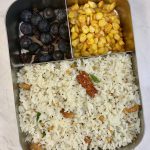 coconut rice with sweet corn and blueberries in bento steel lunch box