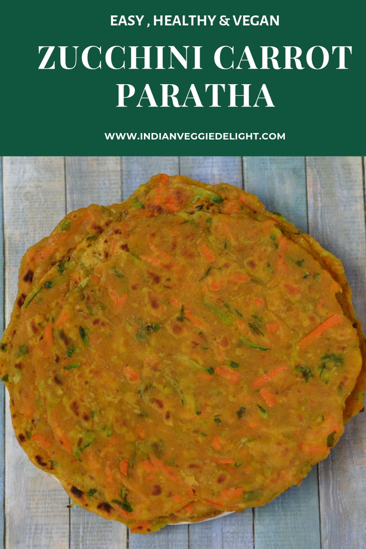Zucchini Carrot Paratha is a simple and nutritious Indian flat bread that is made from grated zucchini ,carrots ,few spices and whole wheat flour.
