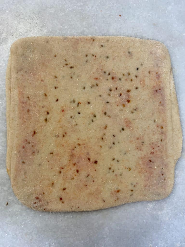 ajwain paratha rolled thin into square