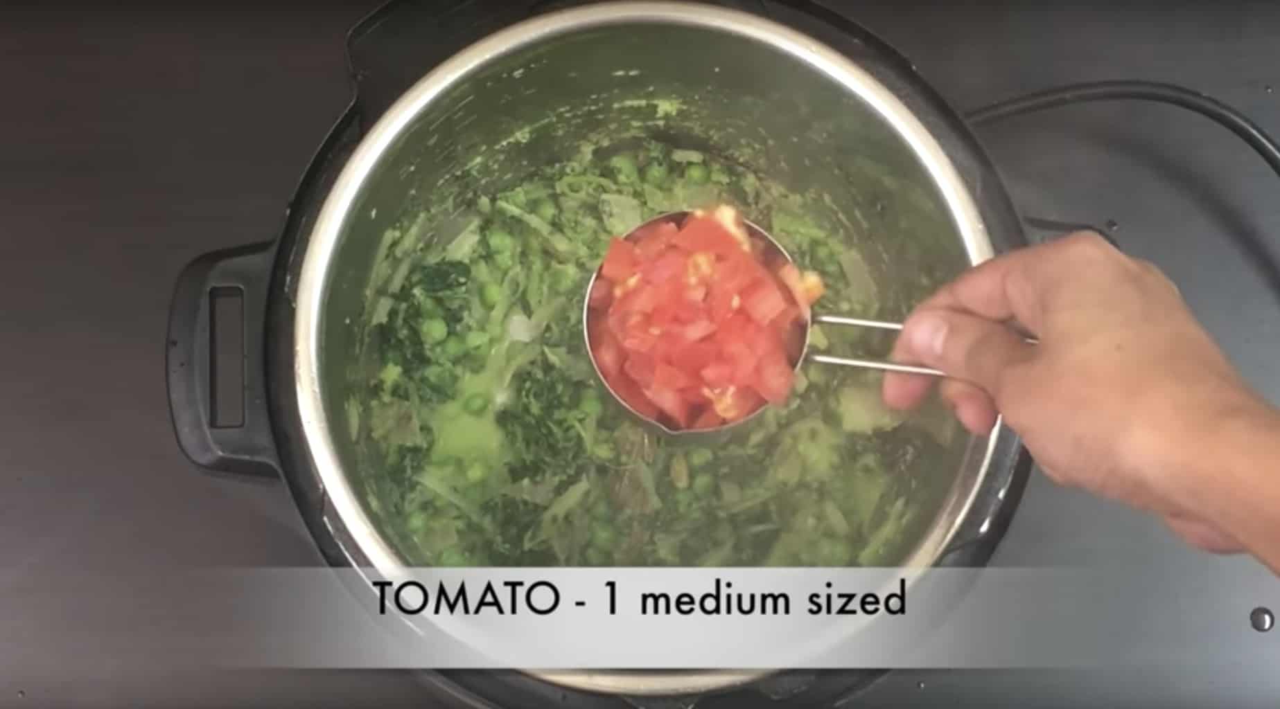 adding tomatoes to methi pulao