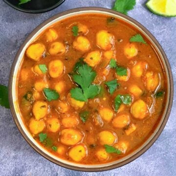 chana masala served in a bowl