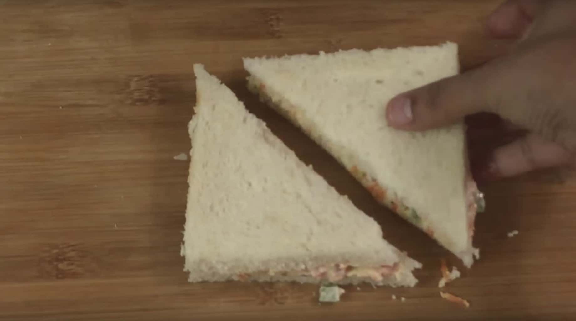 mayo sandwich is cut into triangle
