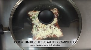 step to cook pizza on tawa till cheese melts