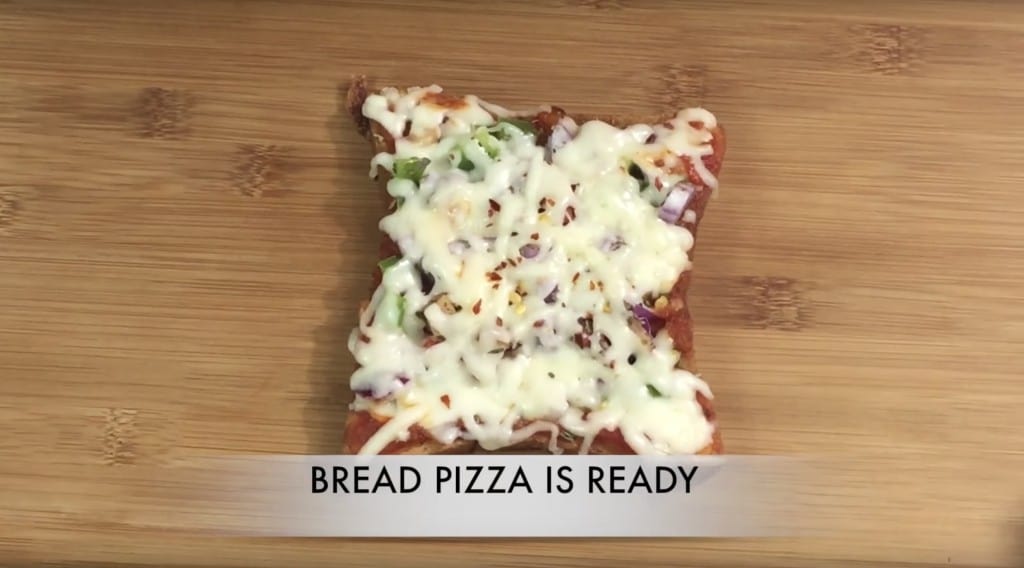 bread pizza on a wooden cardboard