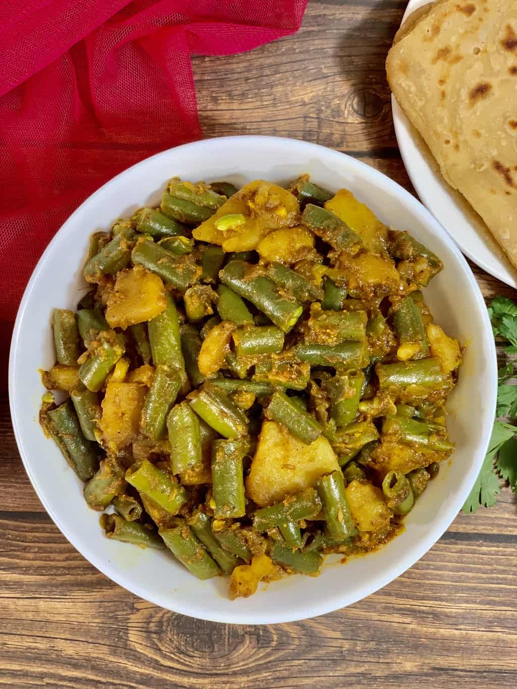 Aloo beans is a popular north Indian dry curry made with potatoes, green beans and few spices