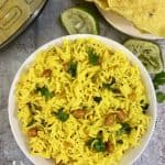 Lemon rice is a simple tangy flavored South Indian rice dish which is prepared with lemon juice, peanuts, and spices