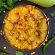 Lauki Chana Dal served in a bowl with cumin tempering on top