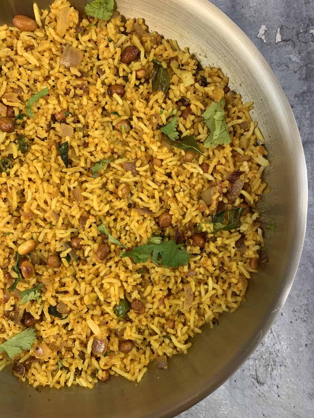 chutney podi rice in a pan garnished with cilantro