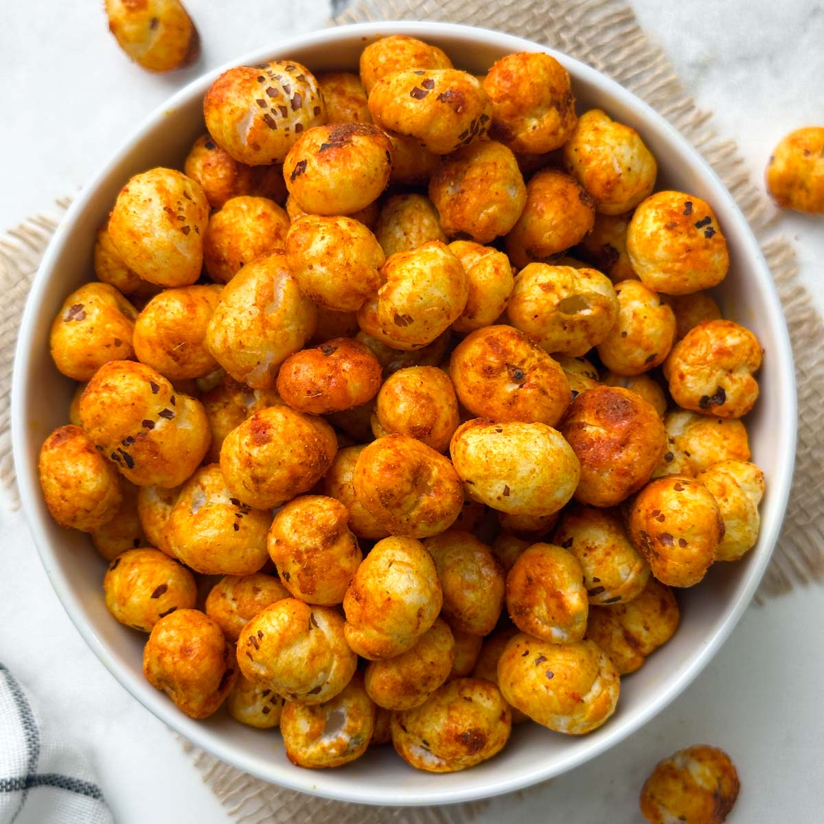 roasted makhana in a white bowl