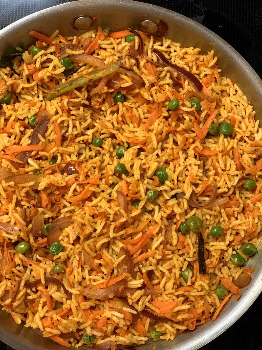 carrot rice in a pan