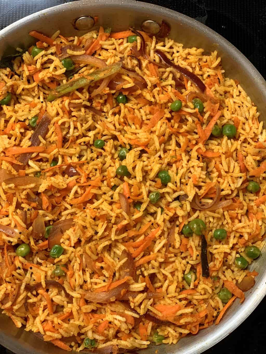 Carrot Rice Recipe is an Indian style rice dish which is quick ,healthy and tasty breakfast ,lunch and kids lunchbox recipe.