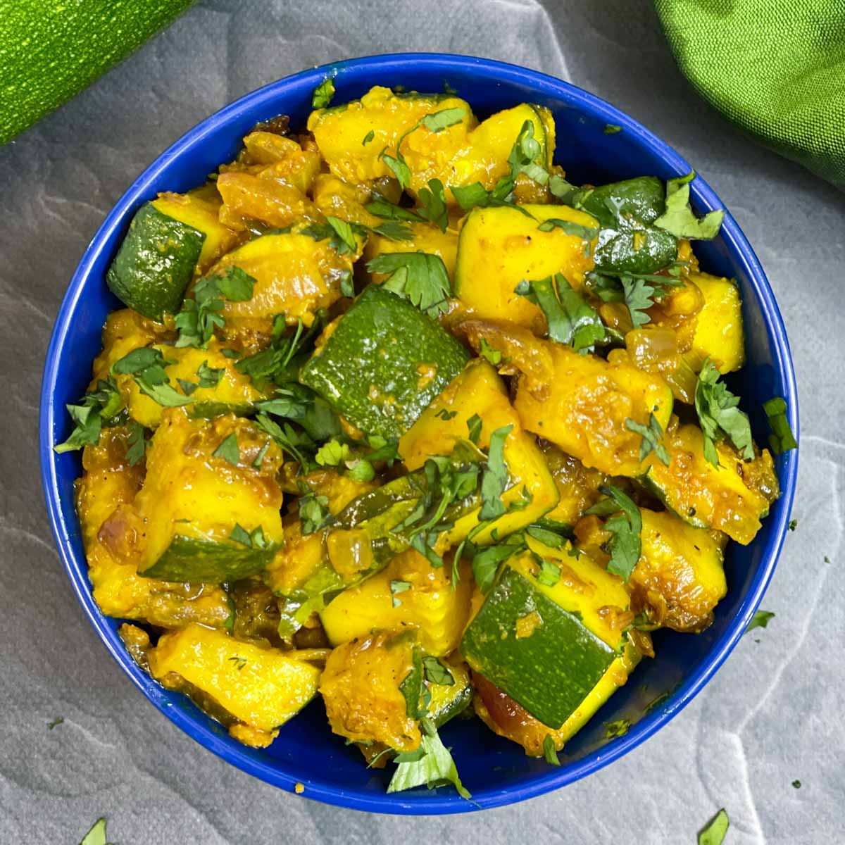 Zucchini Sabji/sabzi served in a bowl garnished with coriander leaves