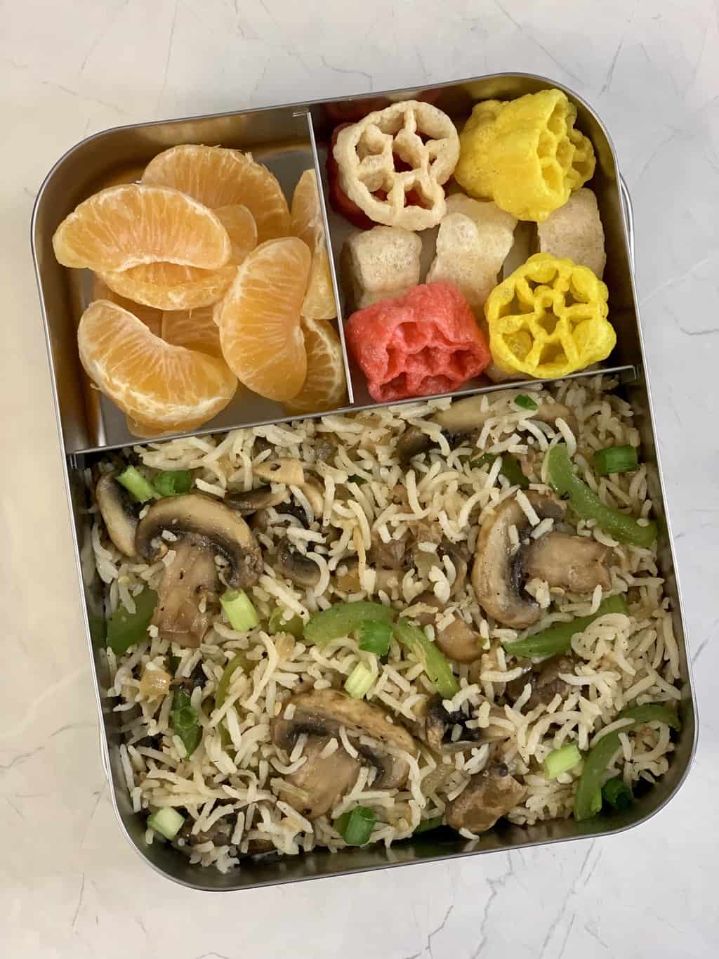 Mushroom Fried Rice with Fryums and Orange in bento steel lunch box