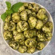 mint makhana served in a bowl with mint leaves on top