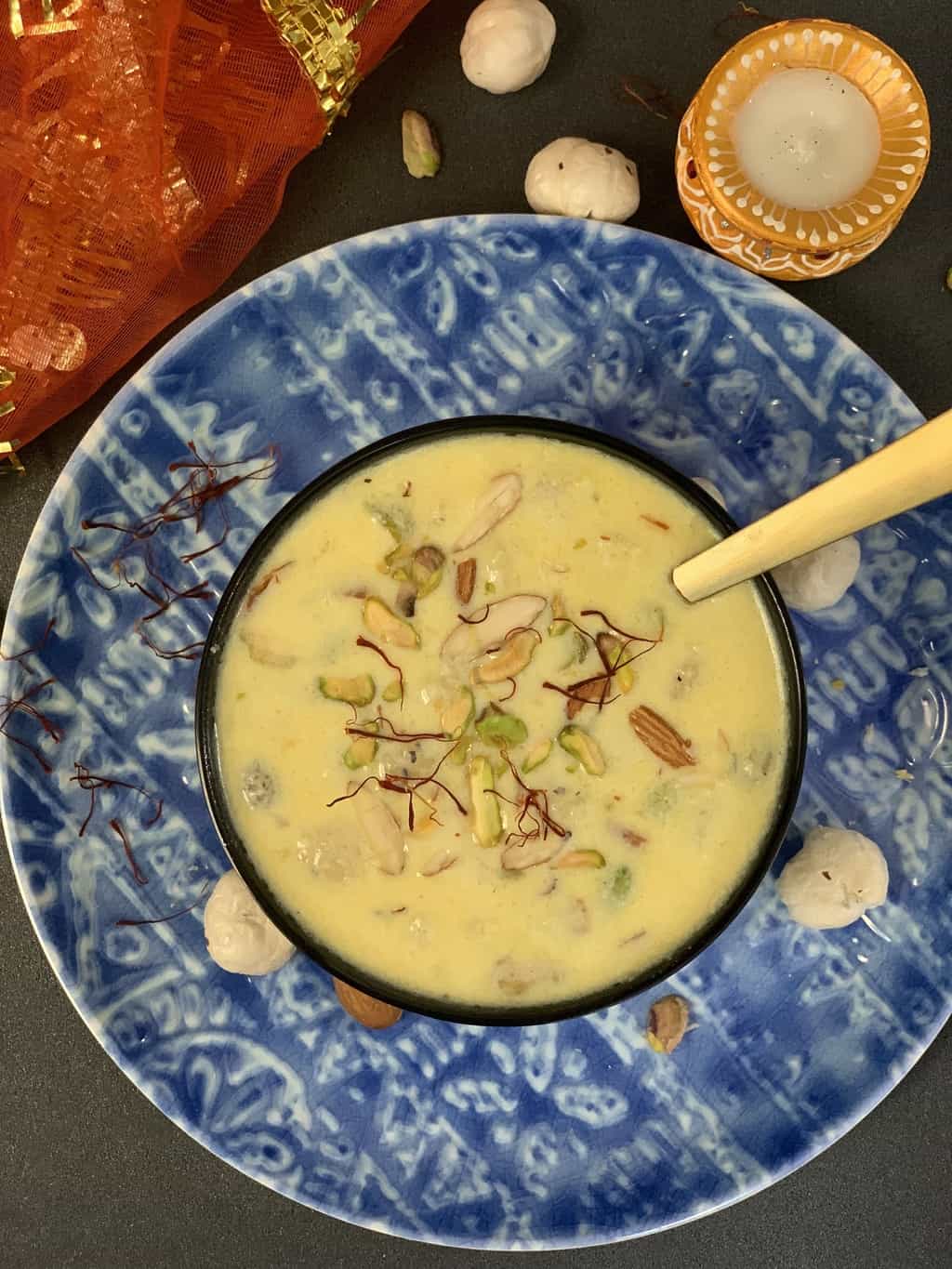 makhana kheer served in a bowl with a spoon