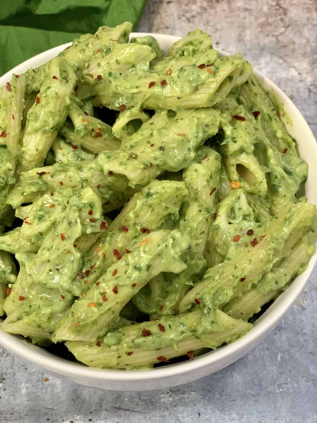 Instant pot Creamy Avocado Pasta served in a white bowl