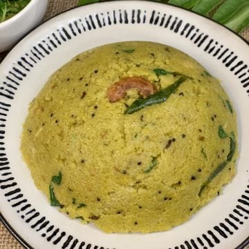 spinach upma served on a plate