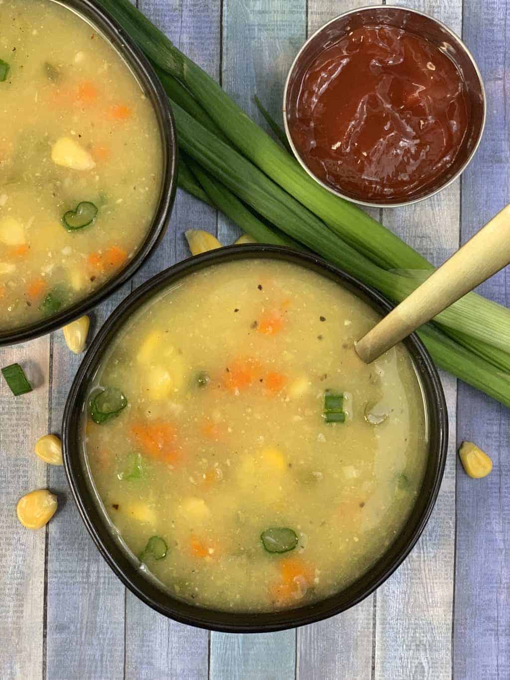 sweet corn soup served in soup bowls