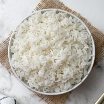 cooked instant pot sona masoori rice in a white bowl