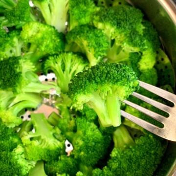 Instant pot Steaming Broccoli in a fork