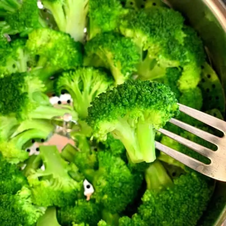 Instant pot Steaming Broccoli in a fork