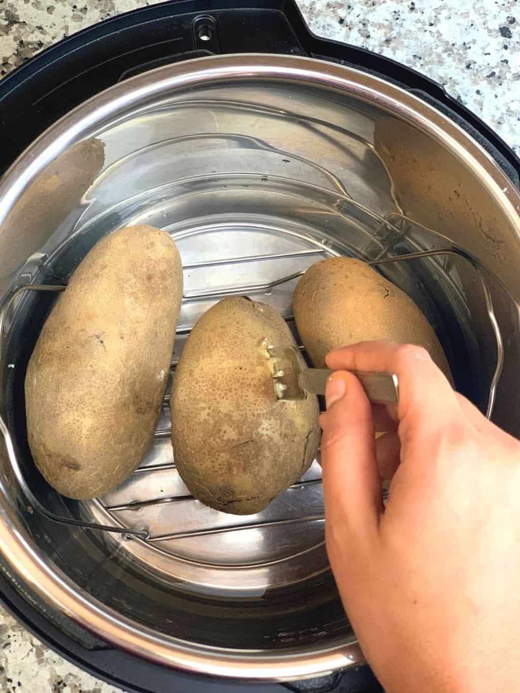 boiled potatoes in a trivet on a instant pot 