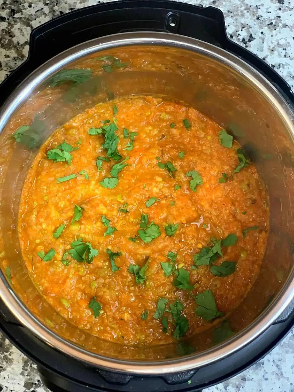pav bhaji in instant pot insert garnished with cilantro