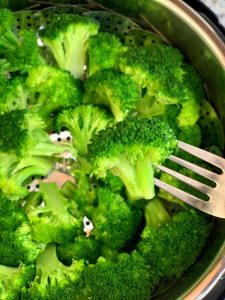 steamed broccoli in a fork