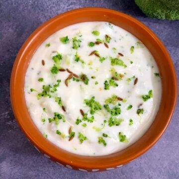 broccoli raita served in a mud pot