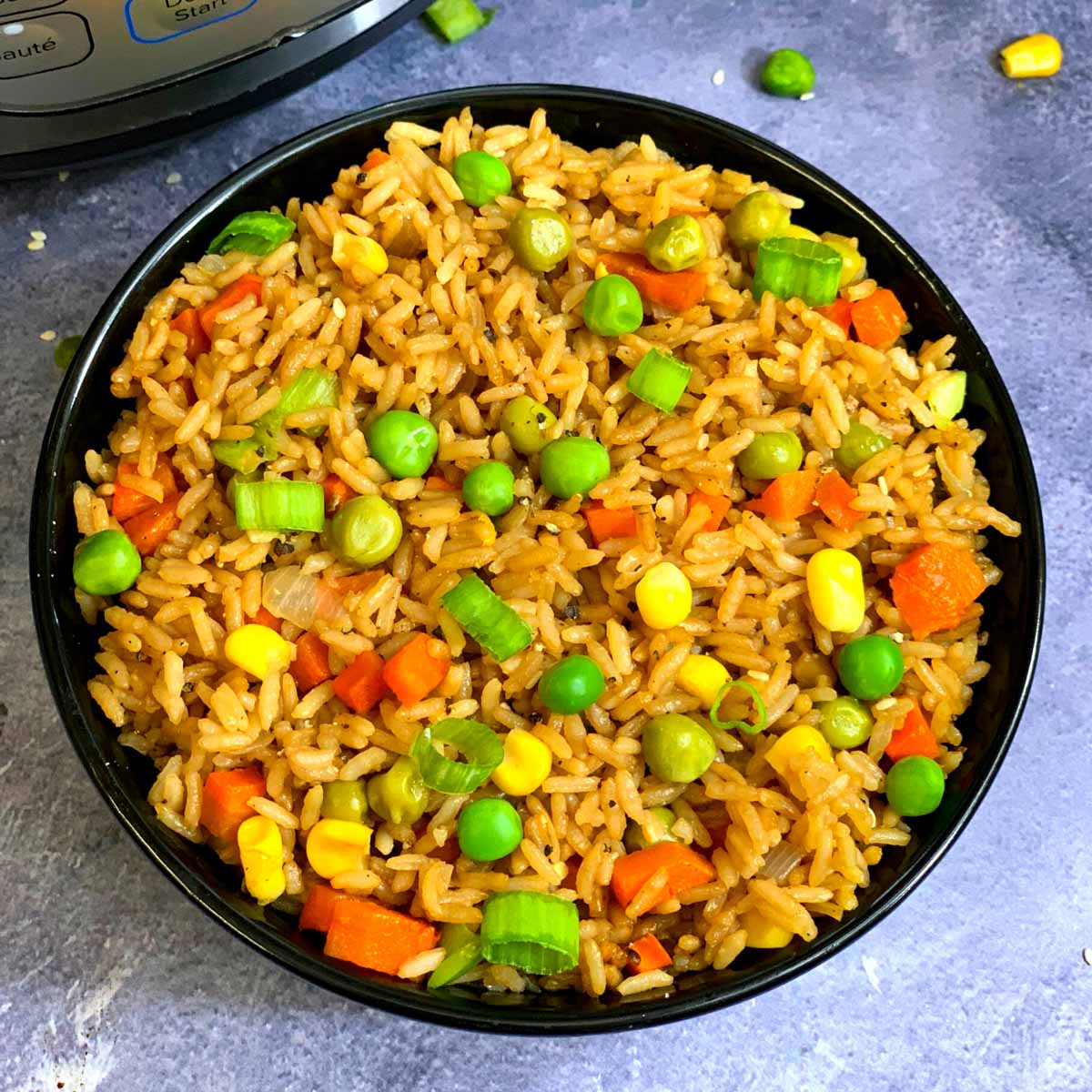 Instant Pot Vegetable Fried Rice served in a black bowl